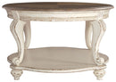 Realyn - Oval Cocktail Table - White / Brown