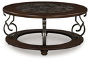 Frallyn - Round Cocktail Table - Dark Brown