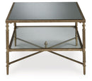 Cloverty - Rectangular Cocktail Table - Aged Gold Finish