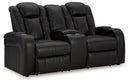 Caveman Den - Power Reclining Loveseat with Console/ Adj Hdrst - Midnight